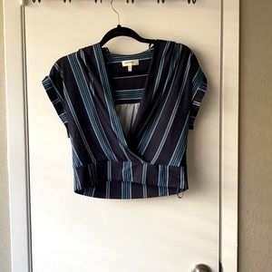 Size XL crop top with plunging neckline. Brand: Monetau Los Angeles